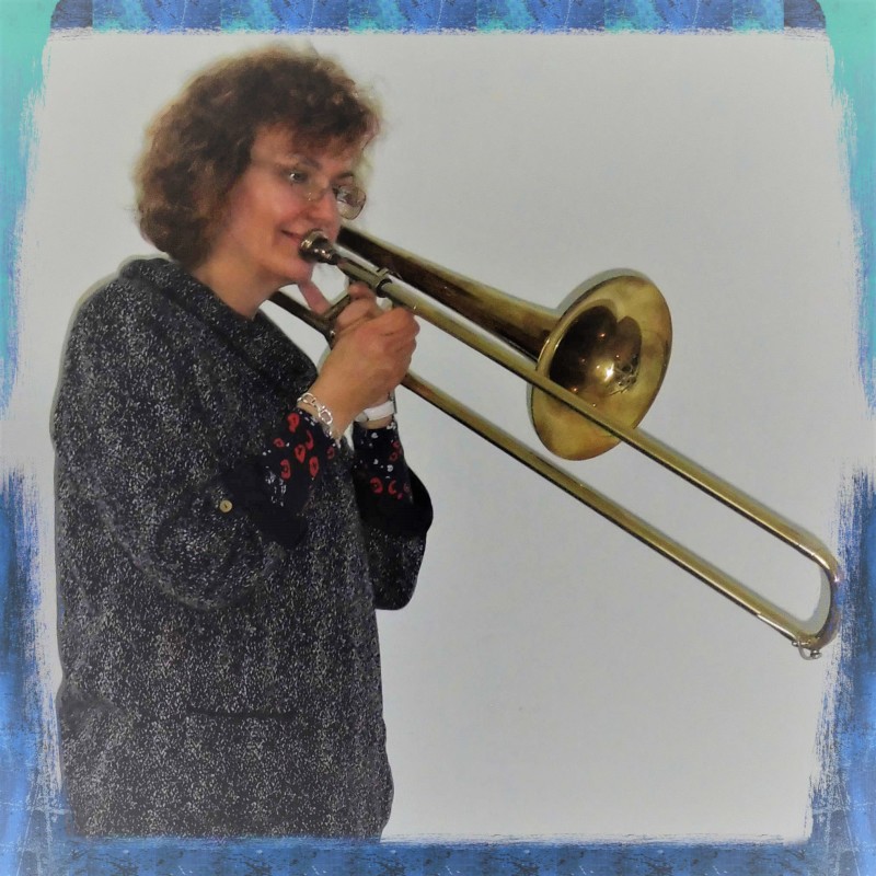 Penny Tedd music teacher, playing the trombone, but not piano, cello, or trumpet in West Sussex.